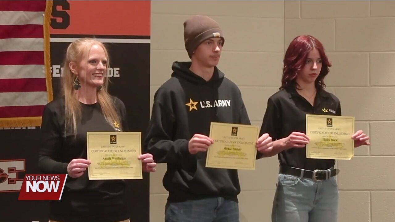 Elida teacher and two seniors sworn Into U.S. Military